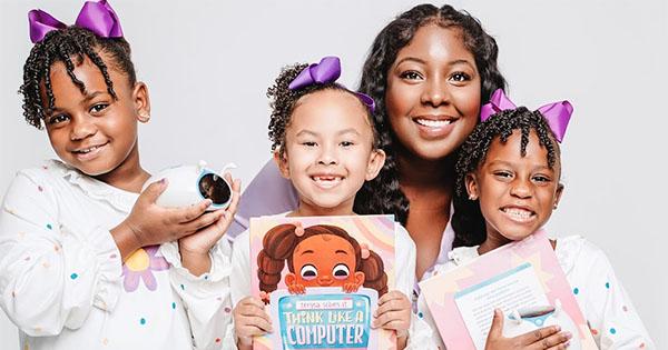 Black Kids Inspired by Female Computer Scientist's Interactive Coding Toy Robot and Book Series